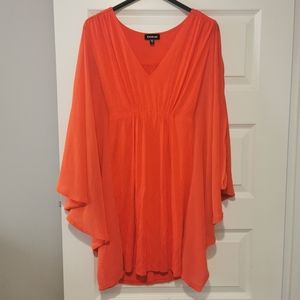 Bebe above the knee dress.  Beautiful orange color.
